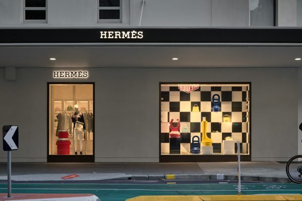 A store front with a bicycle parked in front of it